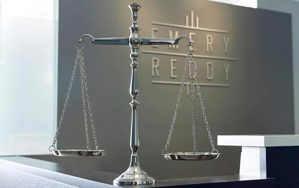 Justice scale positioned within the Emery Reddy office.