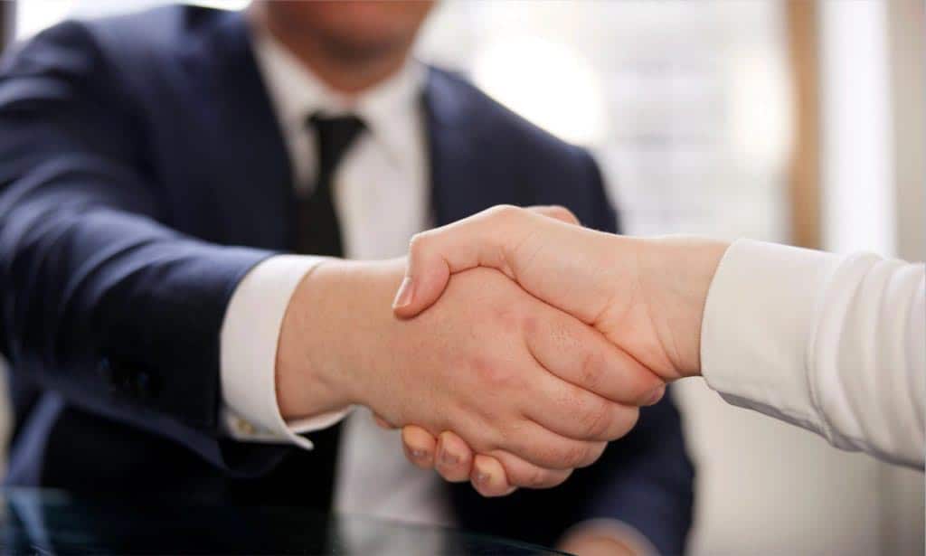 No charges until you successfully win your L&I benefits case | Image of a handshake.