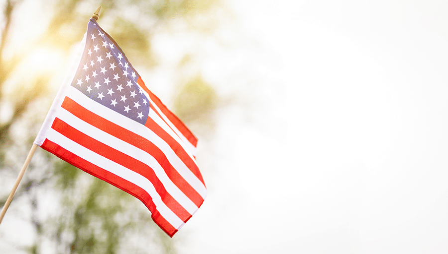 american flag flying in the wind