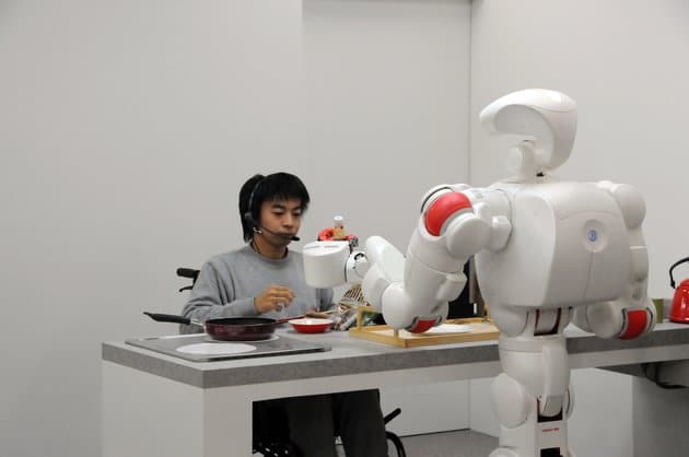 robot and man working together