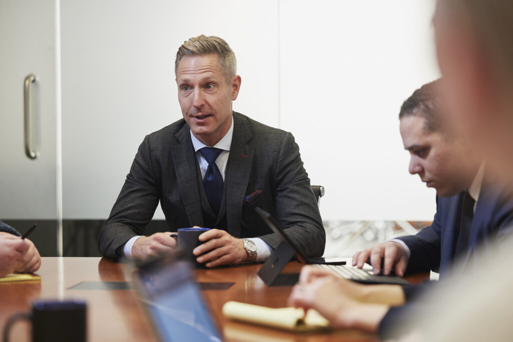 timothy emery at the office conference table